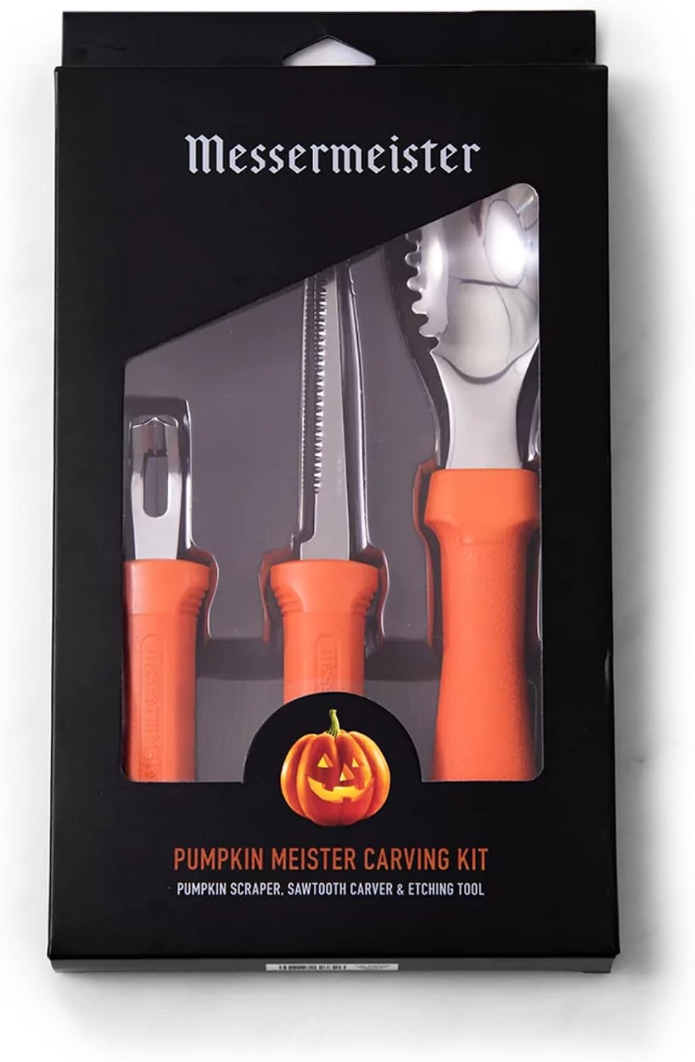 Messermeister Pumpkin Meister Carving Kit in its box: a serrated scraper, a sawtooth carver and an etching tool with orange handles